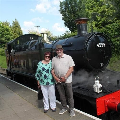 Couple enjoying a day out on the steam train Couple enjoying a day out on the steam train